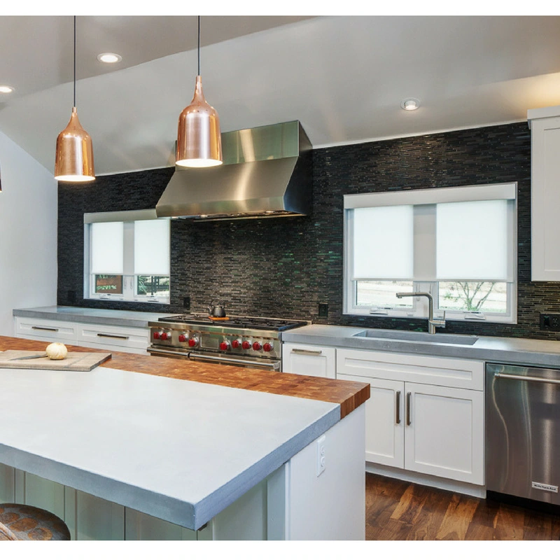 Privacy shades, half-lowered on the windows of a modern kitchen in Austin.