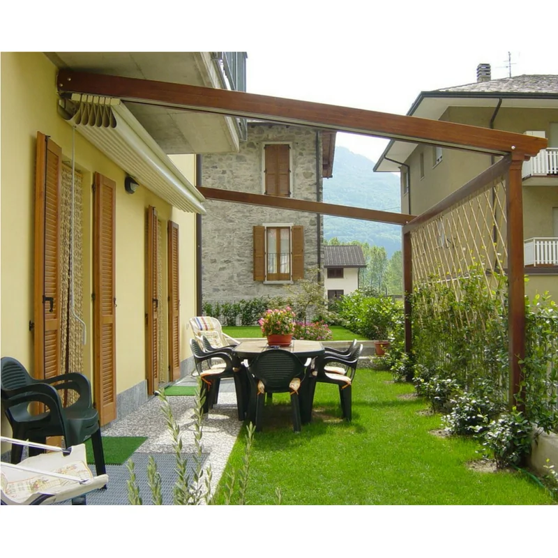 Custom roof structure with a retractable awning covering an outdoor dining area.