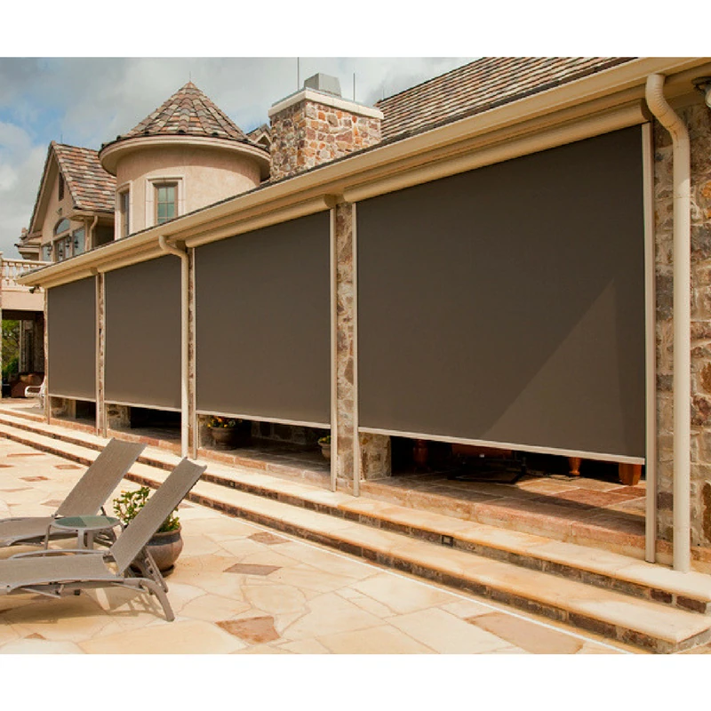 Exterior roller shades installed on four openings of an Austin-area outdoor patio.