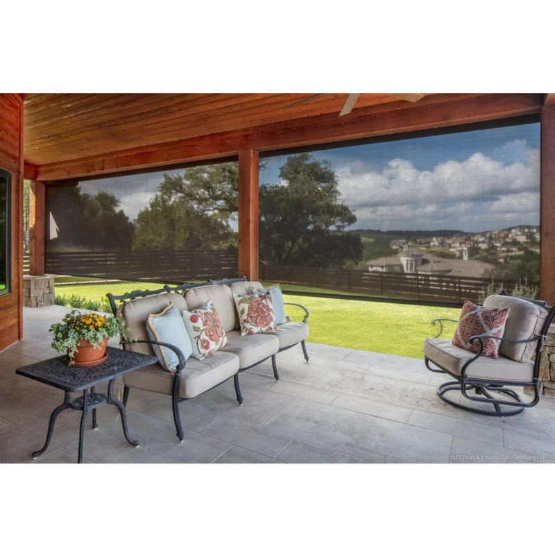Outdoor space in Central Texas with custom insect and privacy screens on a porch.