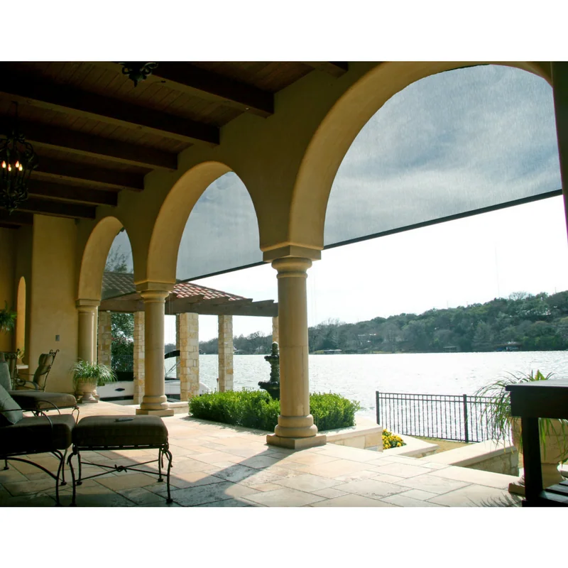 Lakeside home with luxury privacy and insect screens by Texas Sun & Shade.