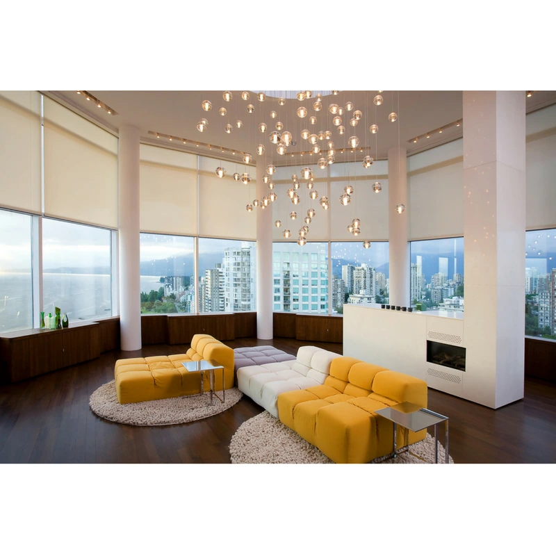 Modern penthouse with custom roller shades installed by Texas Sun & Shade.