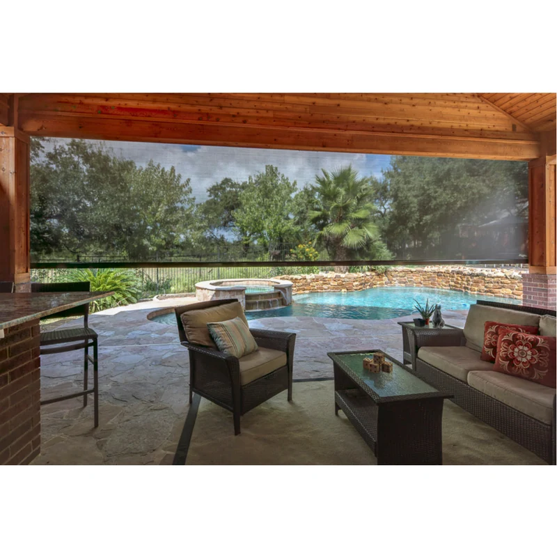 Poolside outdoor living area with half-lowered insect and privacy screens.