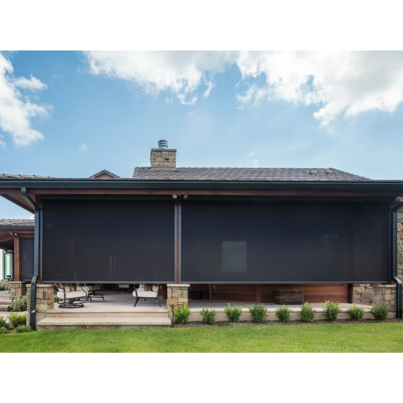 Large, modern patio area with custom-built darkening privacy screens.