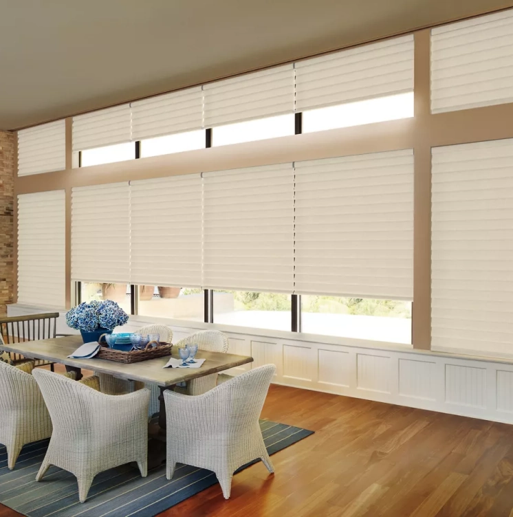 Custom Hunter Douglas shading solution installed in an Austin area dining room.